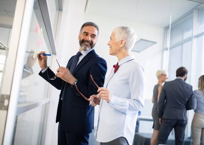 portrait-of-happy-business-people-discussing-toget-3EGU2XM.jpg